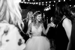 bride on dance floor in black and white photo