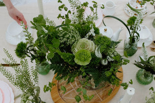 Green flower arrangement on a table for a garden picnic