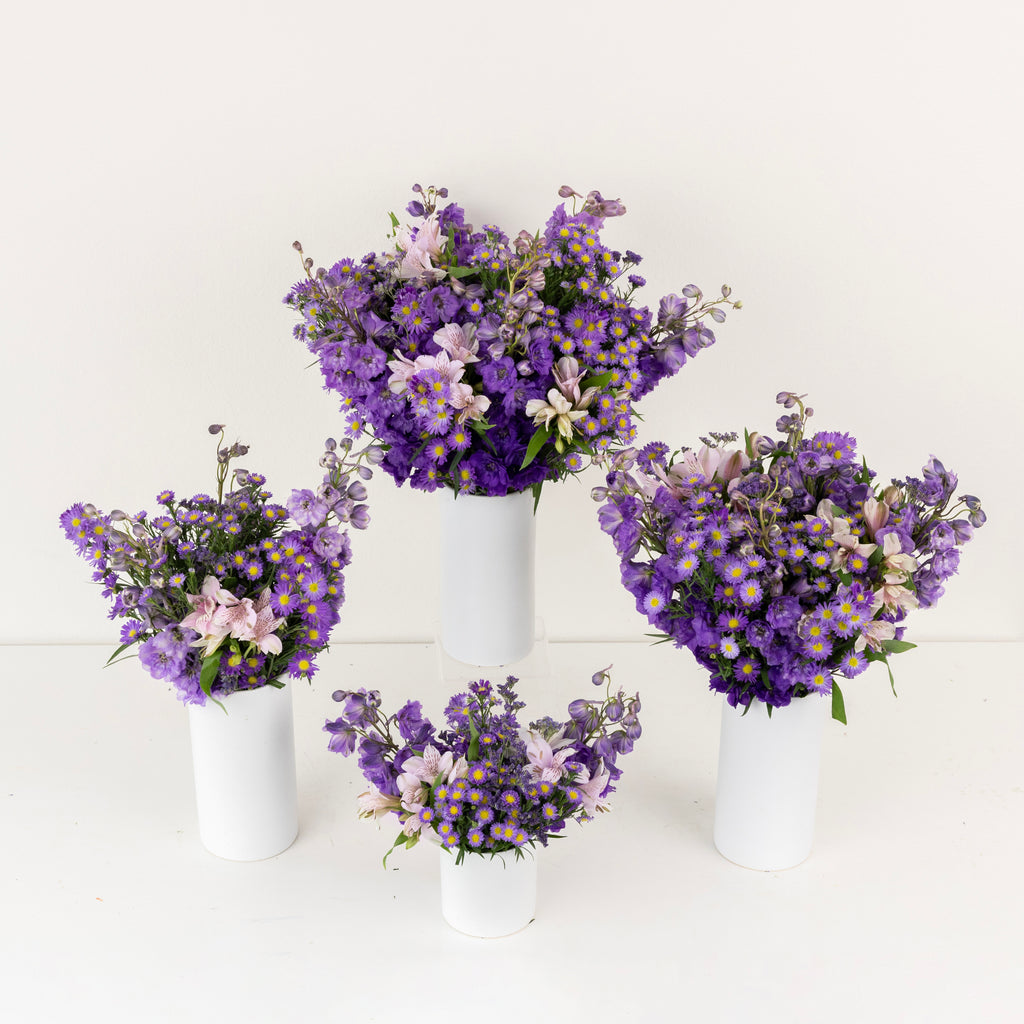 Buy Wholesale Purple Magic Flower Centerpiece in Bulk - FiftyFlowers
