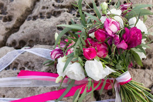 hot pink and white bridal bouquet with hot pink and white ribbon
