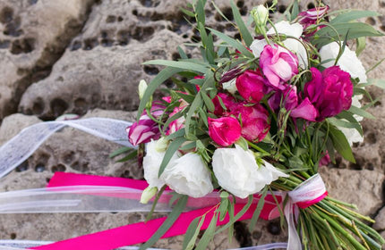 hot pink and white bridal bouquet with hot pink and white ribbon