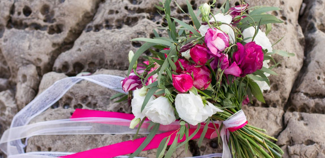 hot pink and white bridal bouquet with hot pink and white ribbon
