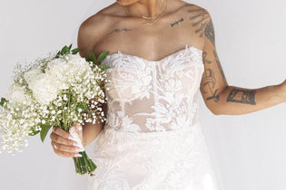 FiftyFlowers White Wedding Bells DIY Flower Kit being held by bride
