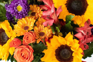 Sunflowers with other yellow and orange flowers