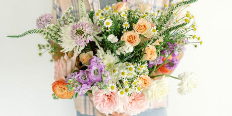 peach, purple, pink and white flower bouquet