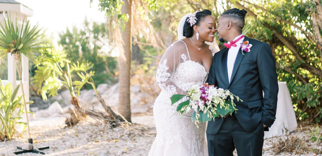 bride and groom on their wedding day looking at each other and smiling