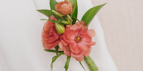 Pink Butterfly Ranunculus Boutonniere