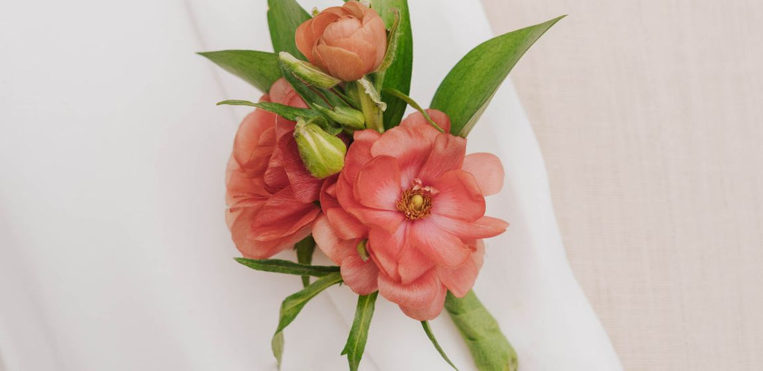 Pink Butterfly Ranunculus Boutonniere