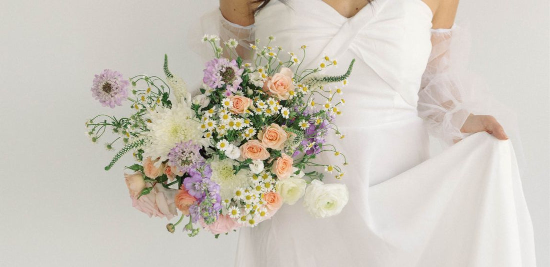 pastel ethereal garden bridal bouquet being held by bride