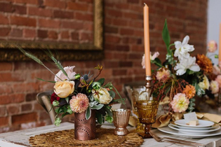 The 6 Hottest Flower Colors for Your Fall Wedding featured image fall colored flowers on table