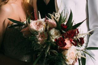astilbe used in burgundy and blush bridal bouquet