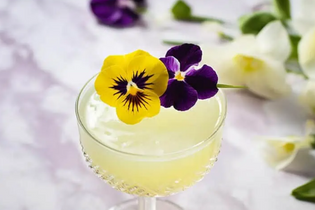 Edible flowers in a cocktail drink