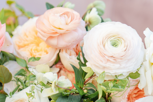Spring wedding flowers such as ranunculus and garden roses