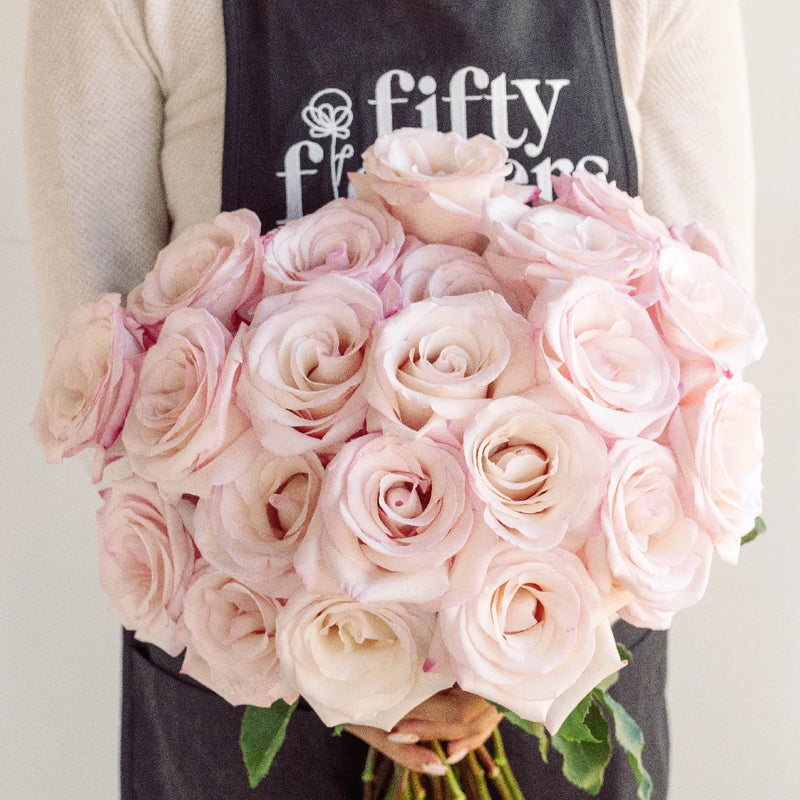 https://fiftyflowers.com/cdn/shop/files/anna-creamy-light-pink-rose-wholesale-flowers-apron_d5c41.webp?v=1696882967&width=800