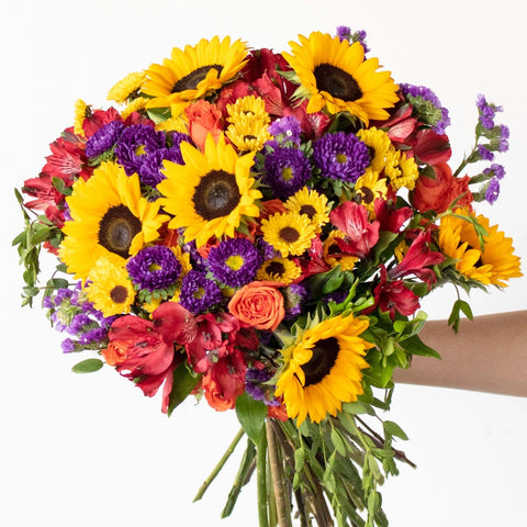 Warm Joy Sunflower Arrangement in Hand