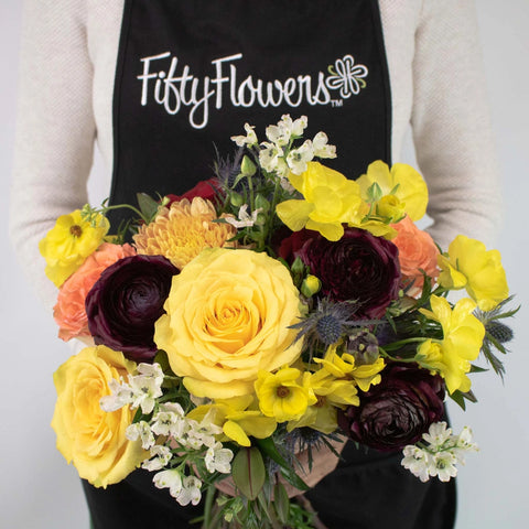 Bronze and Gold Flower Centerpiece in Hand