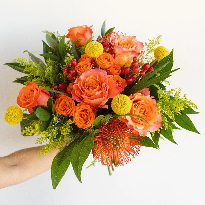 Festive Citrus Flower Centerpiece Hand - Image