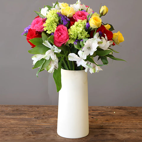Hispanic Heritage Pink Yellow Flower Bunch in Vase