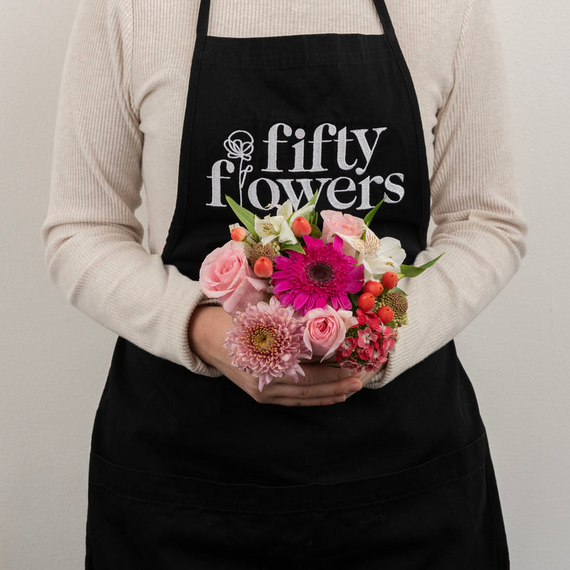 Hues Of Pink Flower Centerpiece Apron - Image