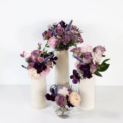 Pleasant Purple Flower Centerpieces - Image