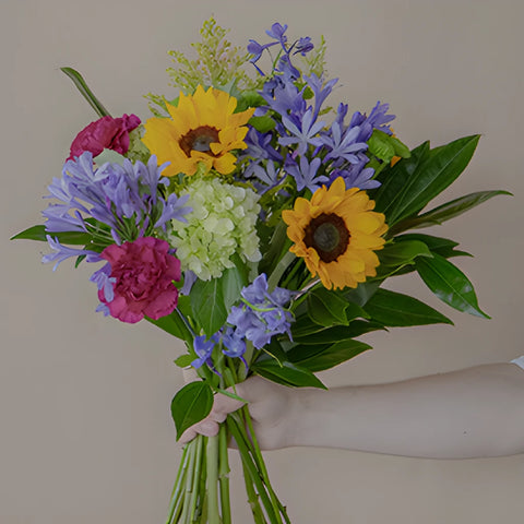Purple Flowers and Sunflowers Bridal Centerpieces