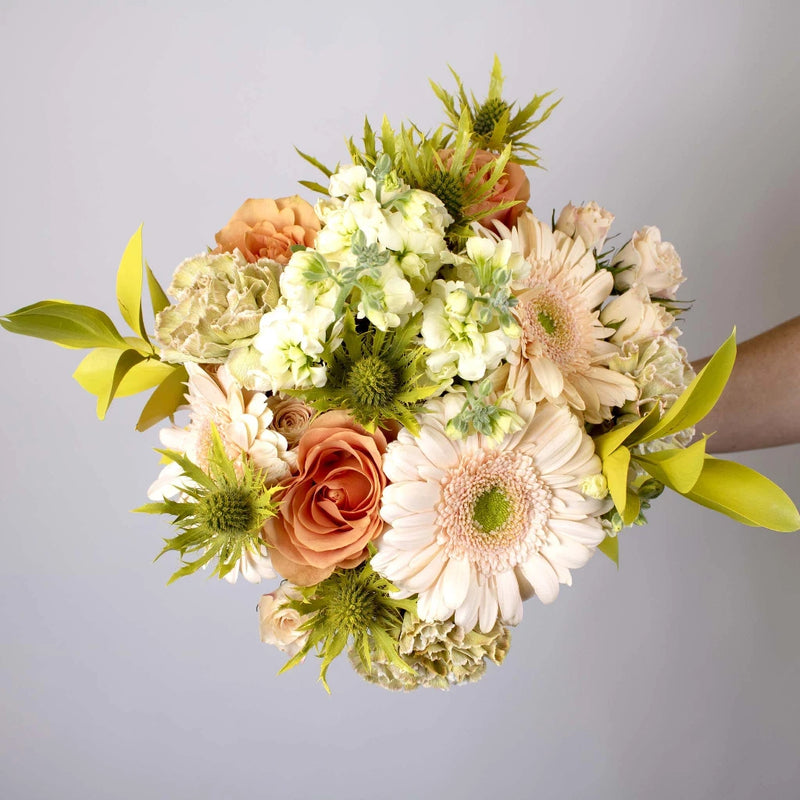 Sepia Toned Flower Centerpiece in Hand