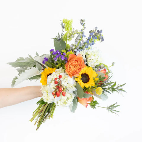 Colorful Meadows Flower Centerpiece Hands - Image