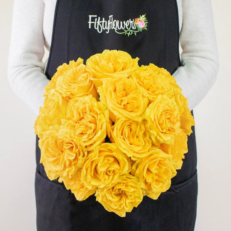 Country Sun Yellow Roses in a Hand