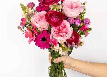 Gummy Pink Flower Arrangement Hand - Image