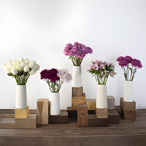 purple diy wedding flowers with roses and cremons