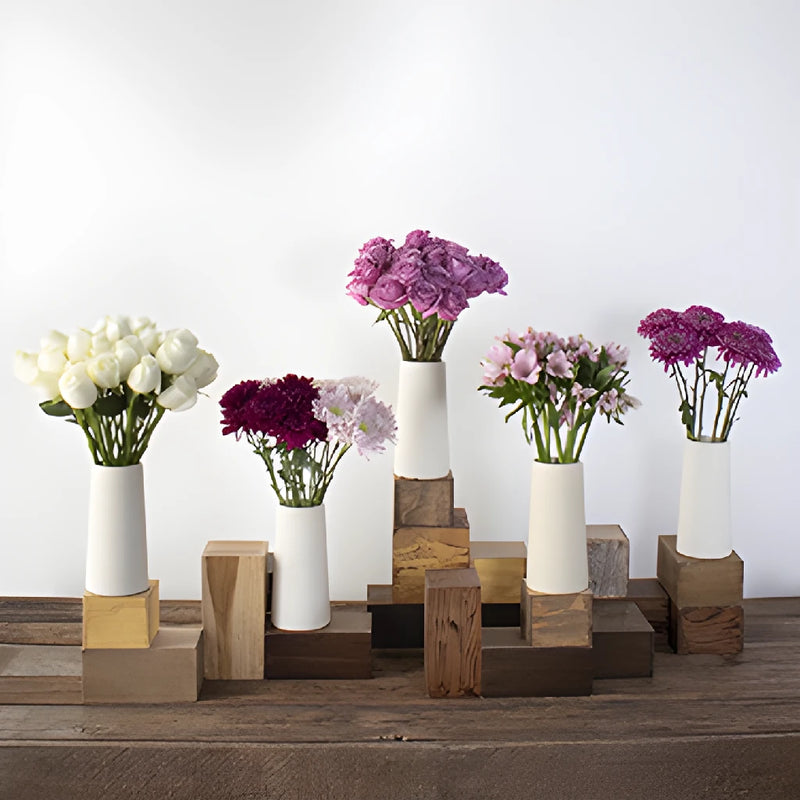 purple diy wedding flowers with roses and cremons