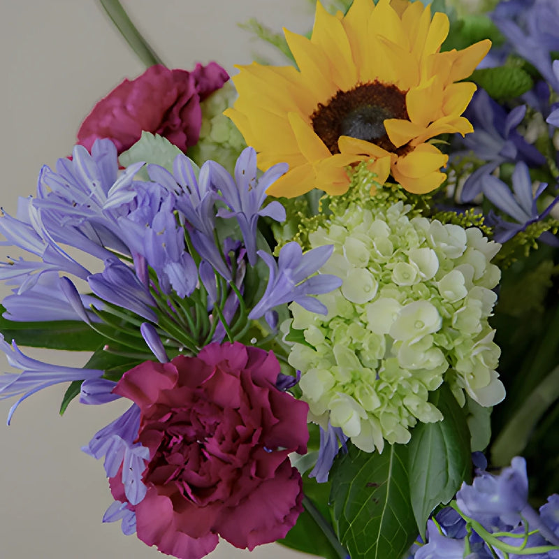 Purple Flowers and Sunflowers Bridal Centerpieces