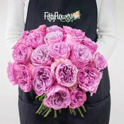 Queens Crown Purple Garden Rose Bunch In a Hand