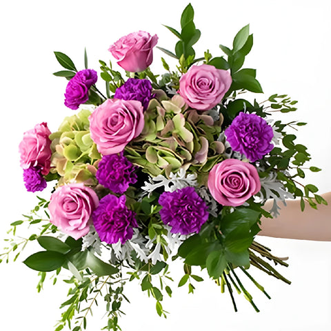 Simply Soothing Purple Flowers Arrangement Hand - Image