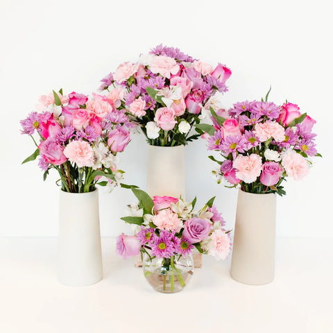 Sweet Harmony Pink Rose Centerpieces Hand - Image