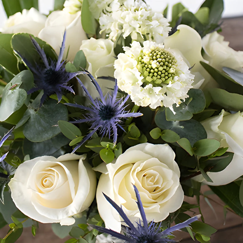 The Victoria and David Bouquet and Boutonniere