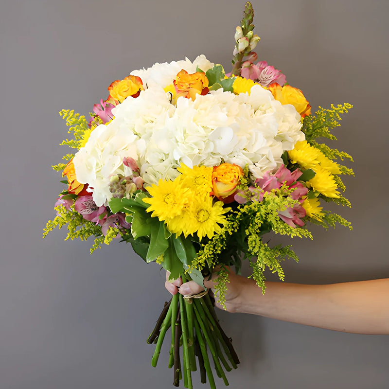 World Smile Day Yellow Flower in Hand