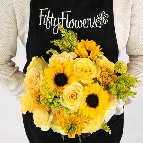 Zanzibar Yellow Flower Centerpiece in Hand