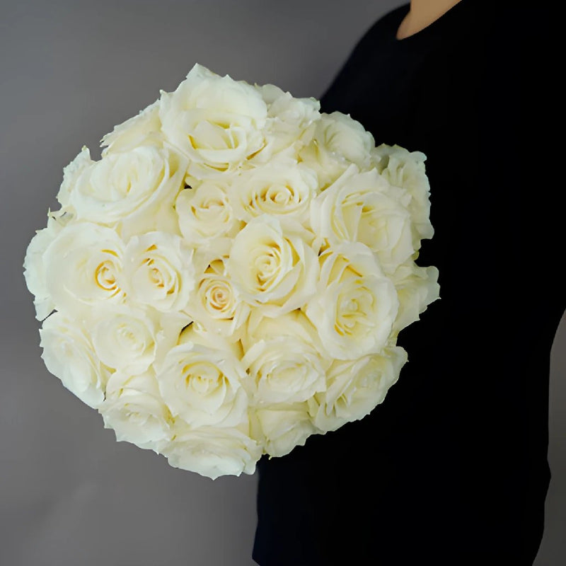 fresh cut white roses sold in an arrangement for flower gifting near me