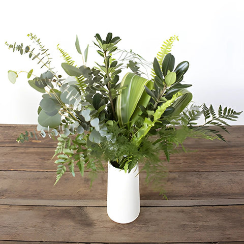 Tommy greenery mix bouquet in a vase