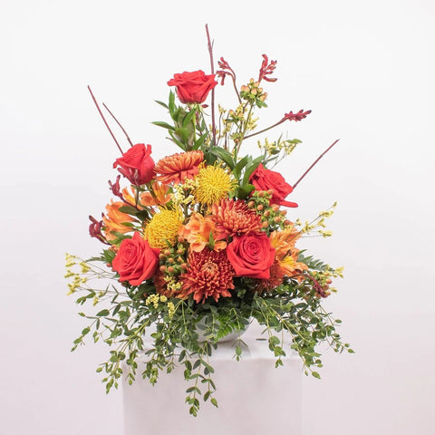 Protea flower arrangement in A Vase