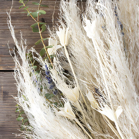 Avery Dried Greenery Wholesale Wreath in a hand