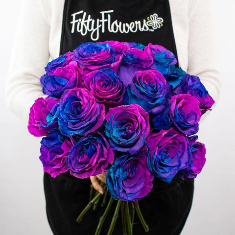 Blue Pink and Purple Rose Flower Bunch in Hand