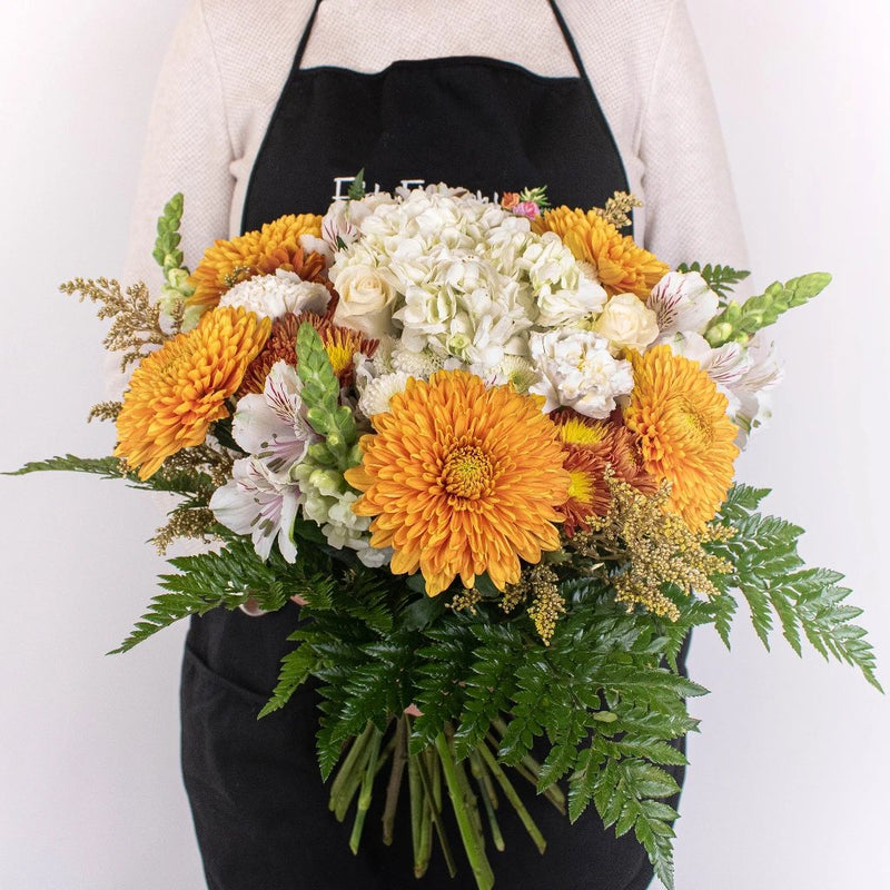 Gathering Place Orange and White Flower Bunch in Hand