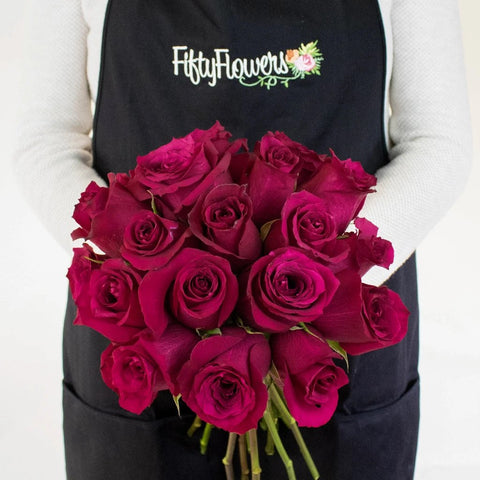 Merlot Red Valentines Rose Bunch in a Hand