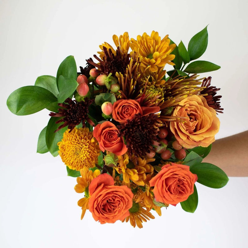 Orange Flower Centerpiece Hand-Held