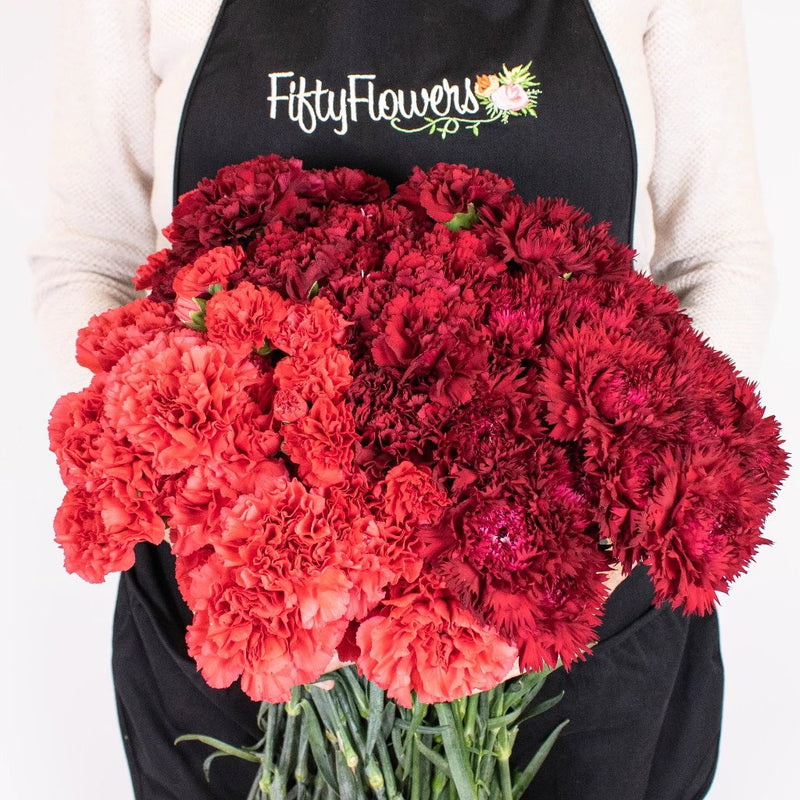 Red and Burgundy Flower Bouquet in Hand