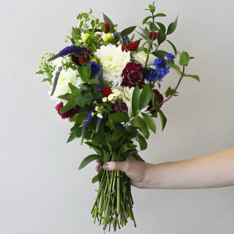 Red White Blue Wildflower Bunch in a hand