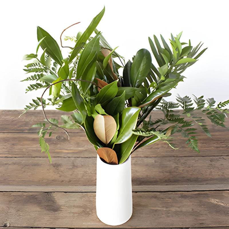 tropical greenery mix bouquet in a vase