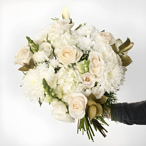 White and Gold Flower Bouquet in Hand